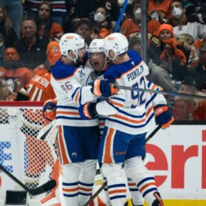 Vasily Podkolzin's Impact with Louie DeBrusk